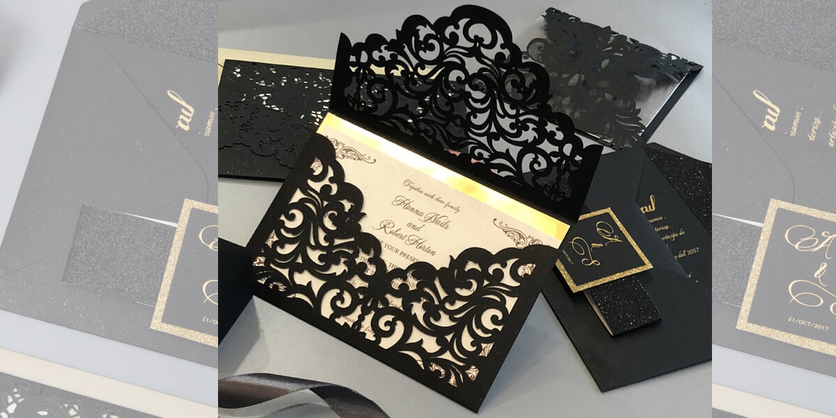 Black lasercut with gold foil wedding invitation