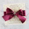 WEDINV188 Ivory lasecut wedding invitation with burgundy ribbon and diamante 100x100