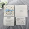 WEDINV188 ivory lasercut invitation with baby blue bow and printed in grey wedding set